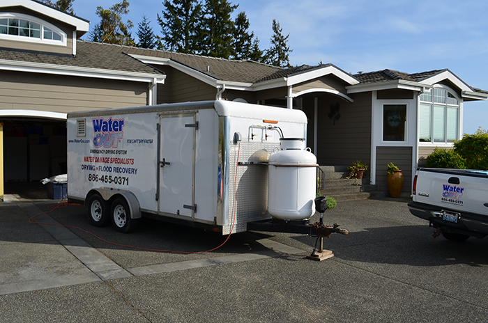 water out south puget sound water damage restoration vehicle at a residential home
